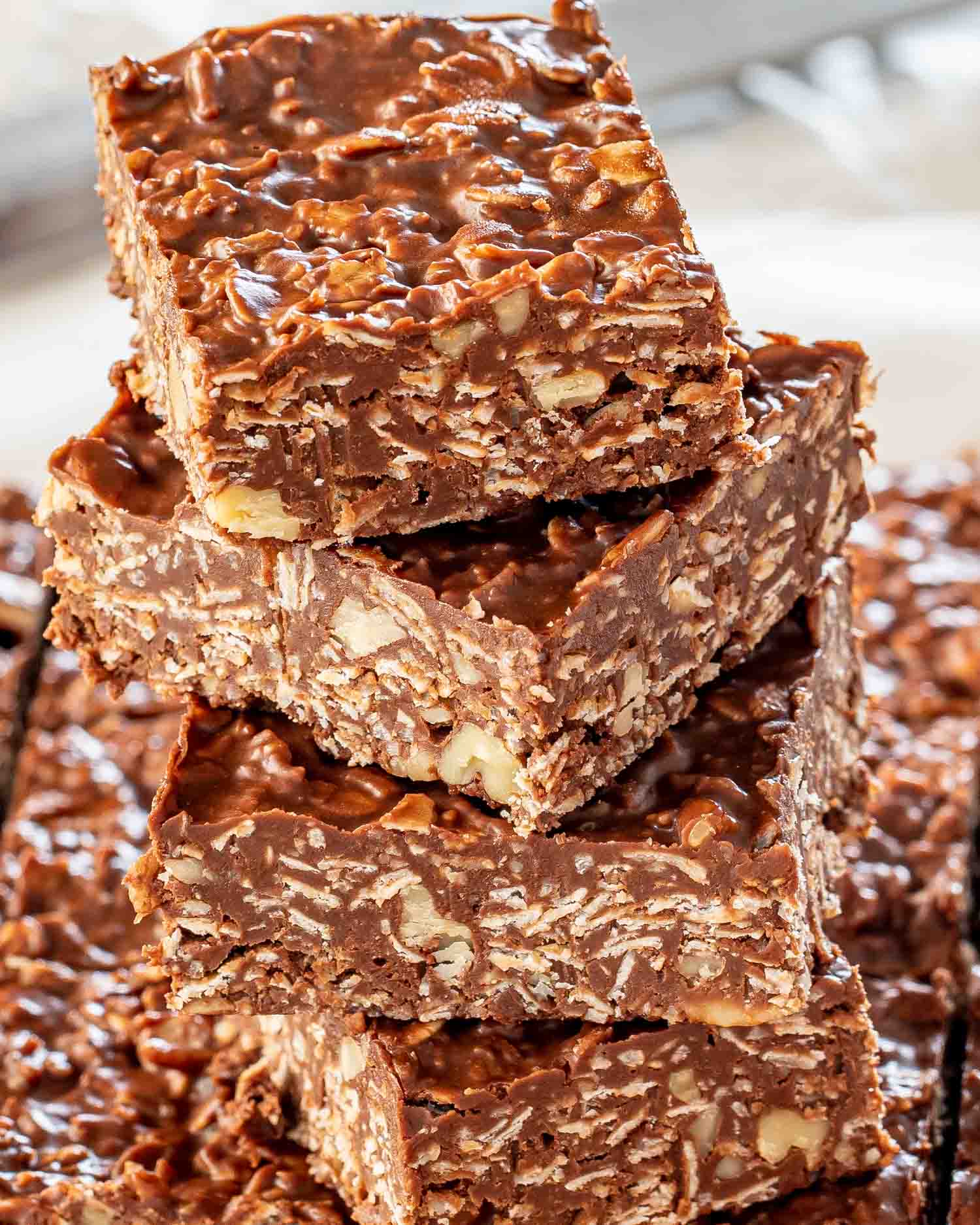 a stack of no bake peanut butter chocolate bars.