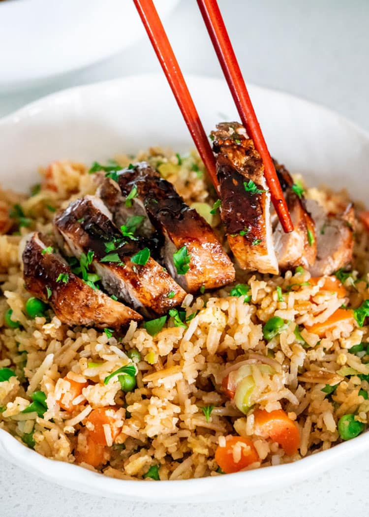 This Garlic Soy Chicken proves how a simple Asian inspired glaze can turn simple boring chicken thighs into delicious, super flavorful, tender chicken thighs that will be the star of your dinner. #garlicsoychicken #chicken #winnerwinnerchickendinner