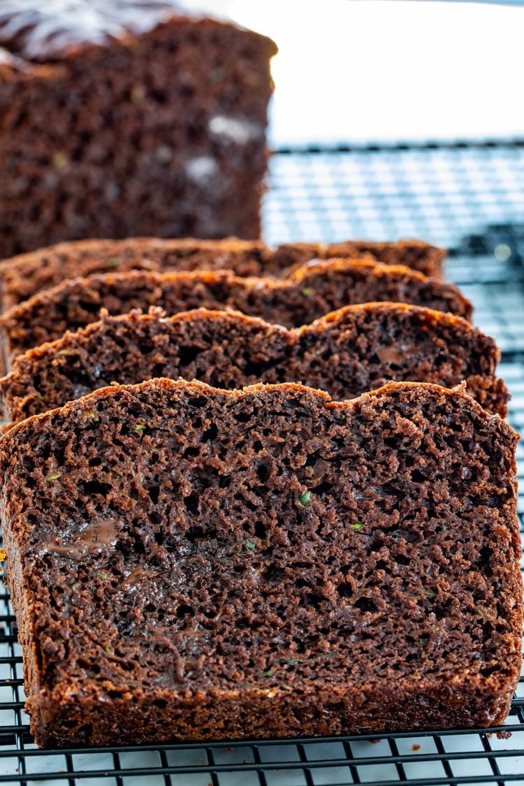 slices of chocolate zucchini bread on a cooling rack