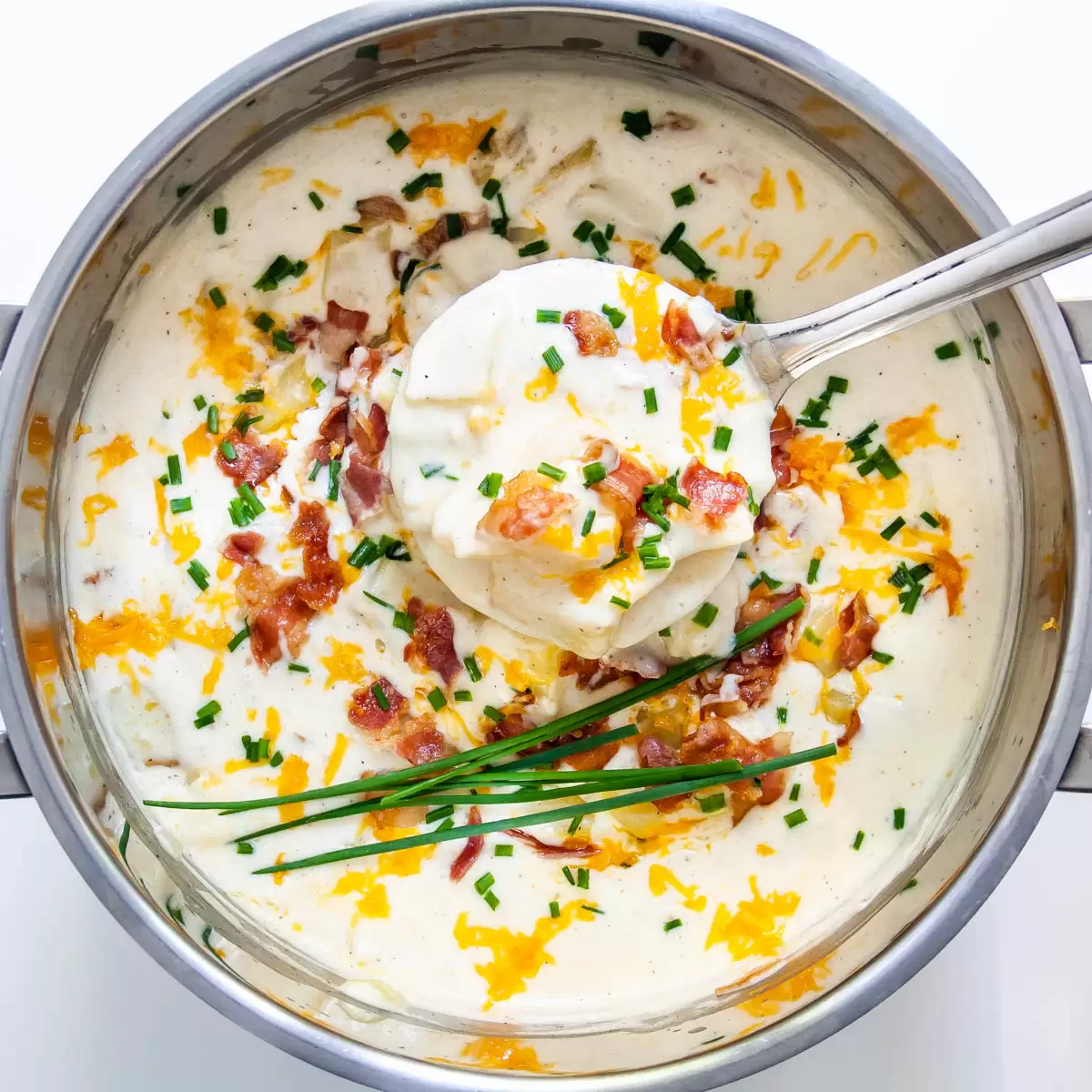 overhead shot of baked potato soup in a pot