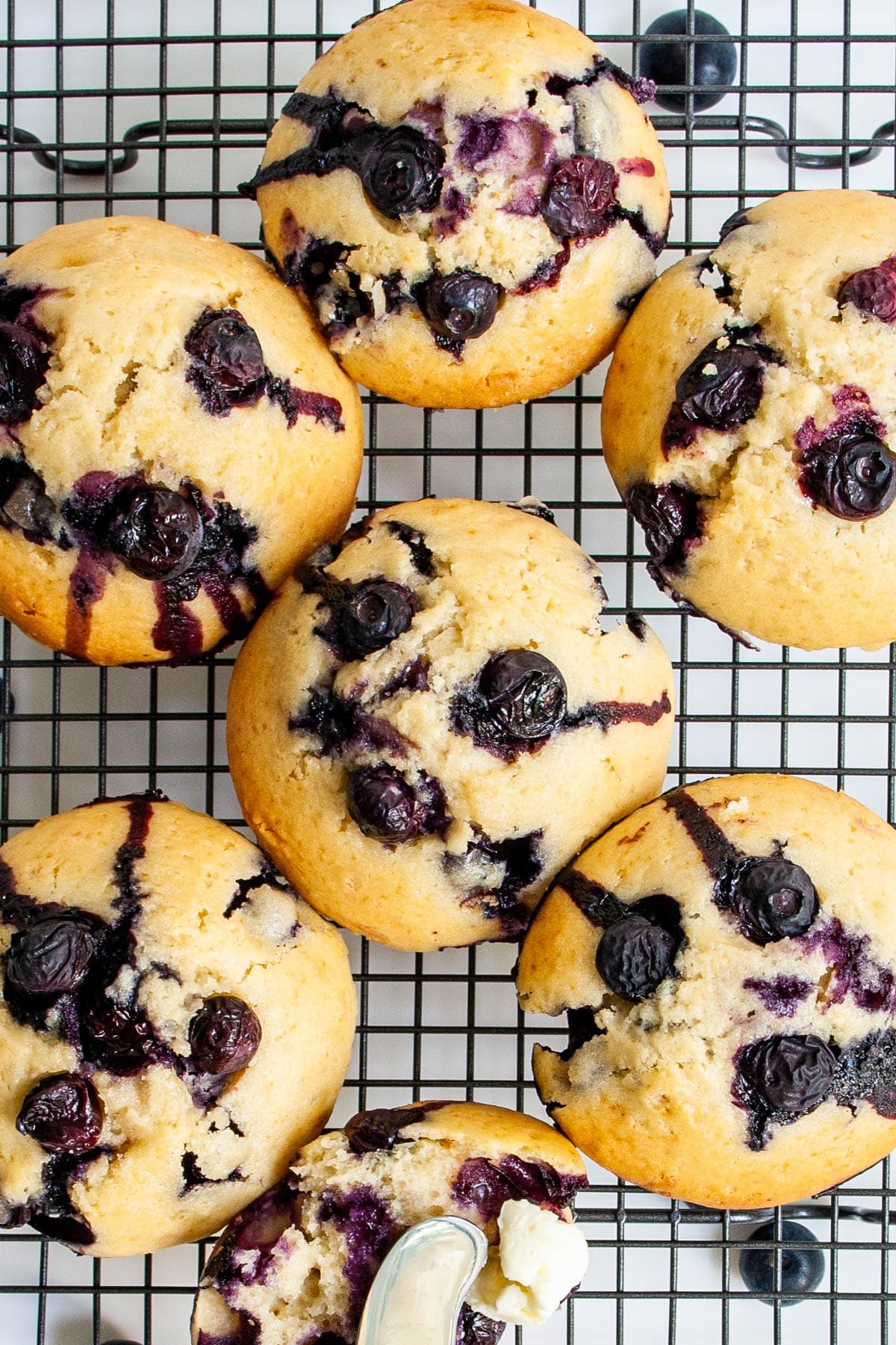 overhead shot blueberry muffins on a cooling rack