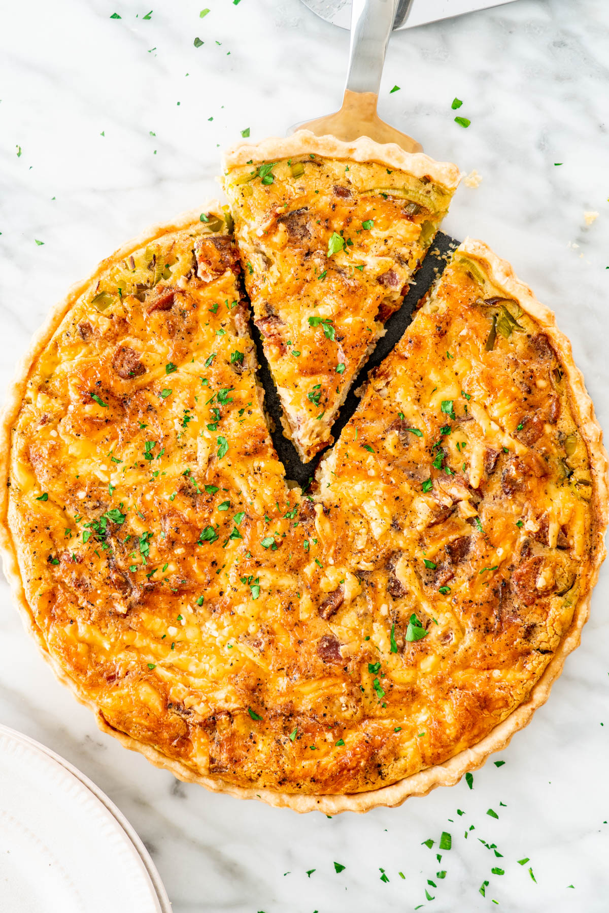overhead shot of a bacon and cheese quiche
