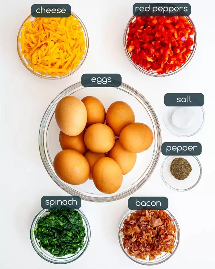 overhead shot of all the ingredients needed to make breakfast egg muffins