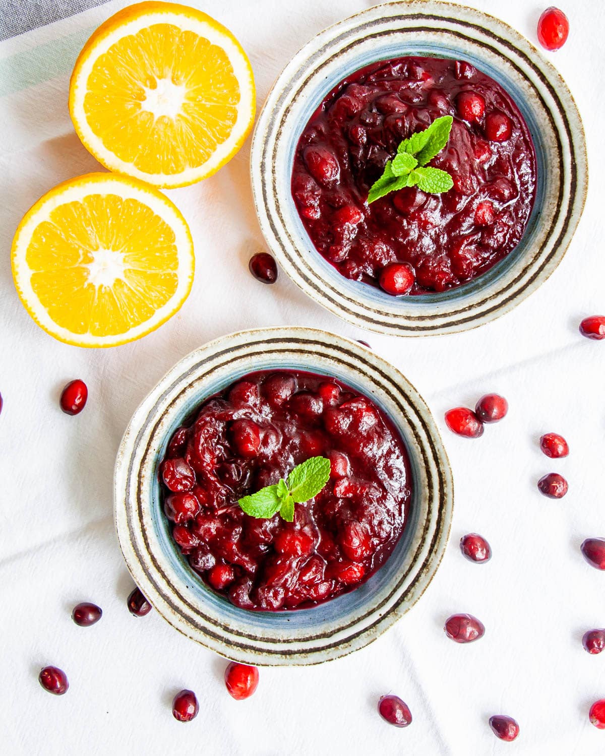 overhead shot of two bowls with cranberry sauce