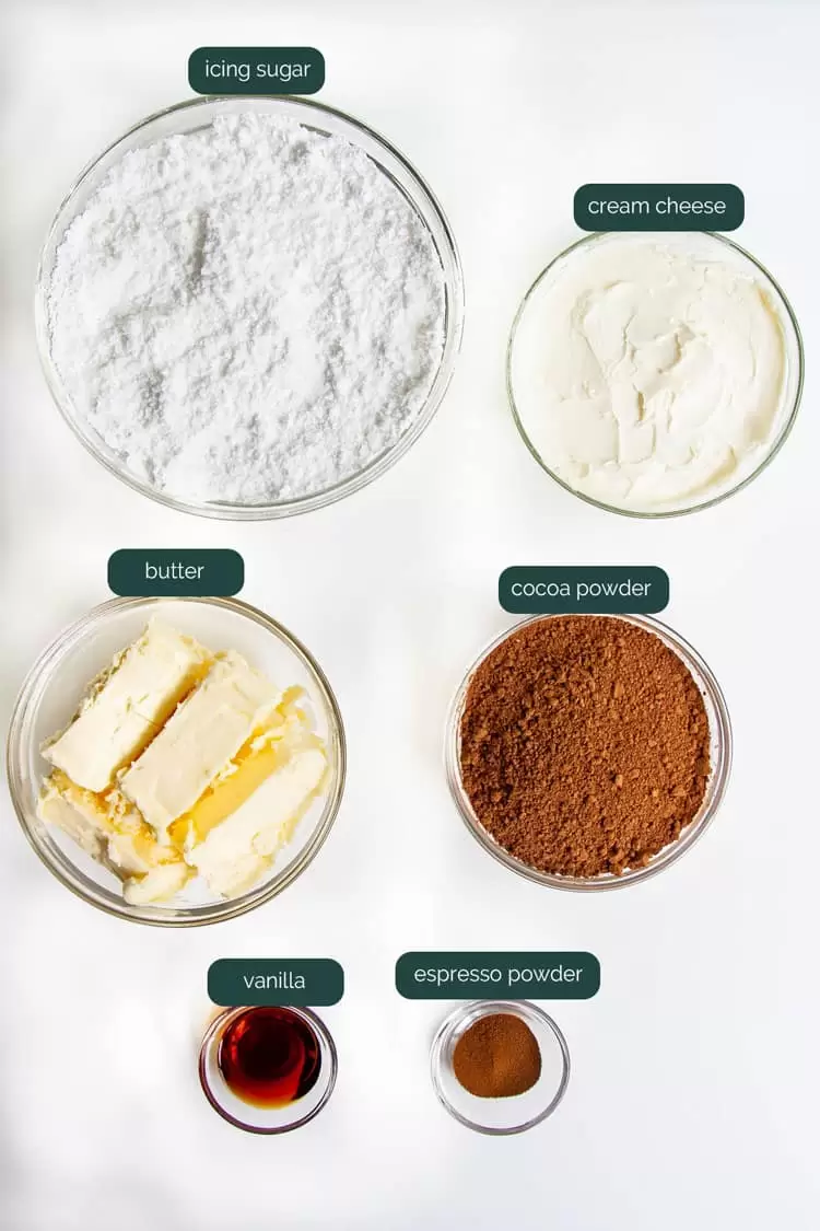 overhead shot of ingredients needed to make chocolate cream cheese frosting