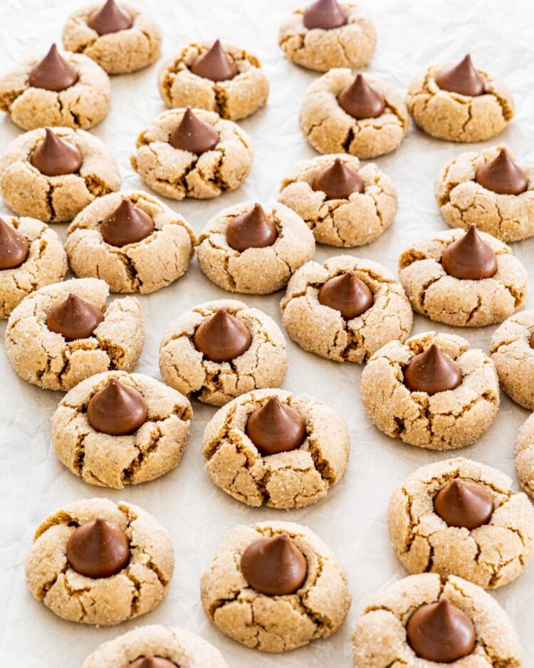 peanut butter blossom cookies on a parchment paper