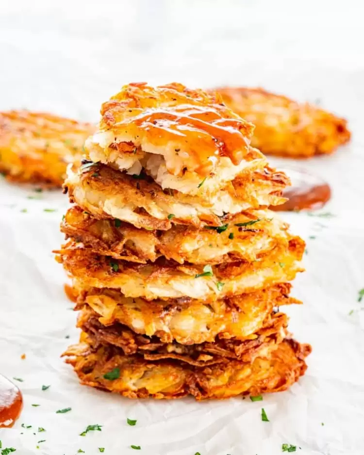 a stack of homemade hash browns
