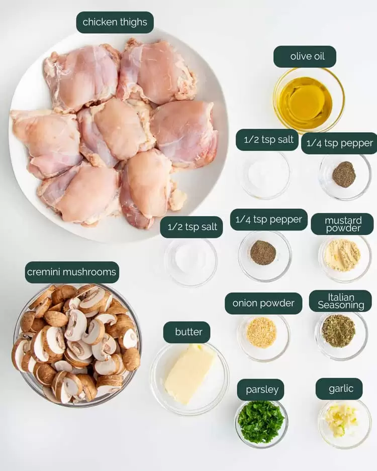overhead shot of ingredients needed to make skillet chicken and mushrooms