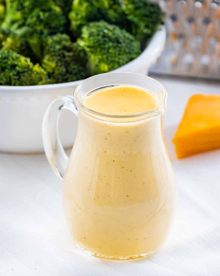 homemade cheese sauce in a bottle