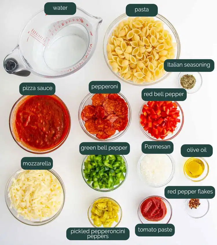 overhead shot of ingredients needed to make pepperoni pizza pasta