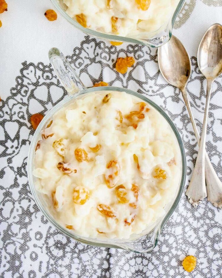overhead shot of rice pudding in a glass bowl