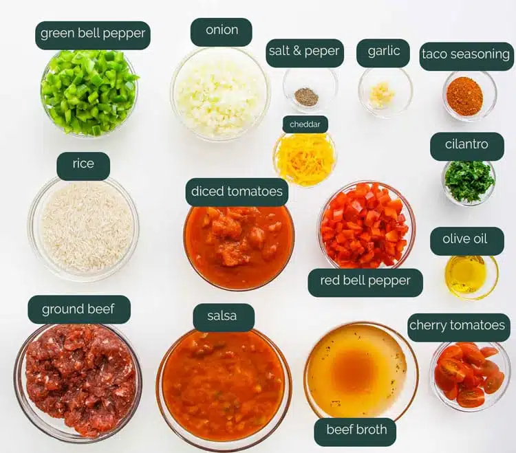 overhead shot of all the ingredients necessary to make a taco stuffed pepper casserole