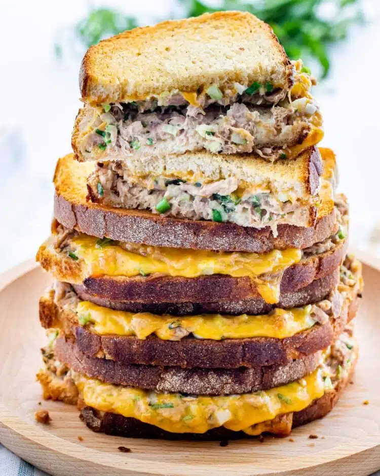 a gorgeous stack of tuna melts with the top one cut in half