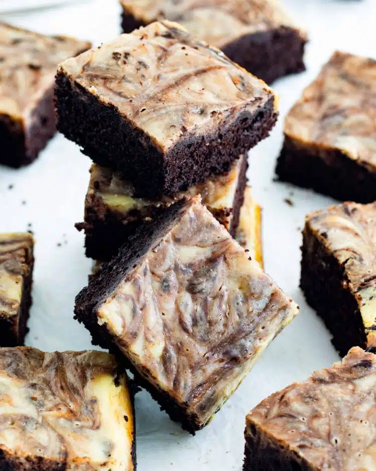 scattered cream cheese brownies with a few stacked