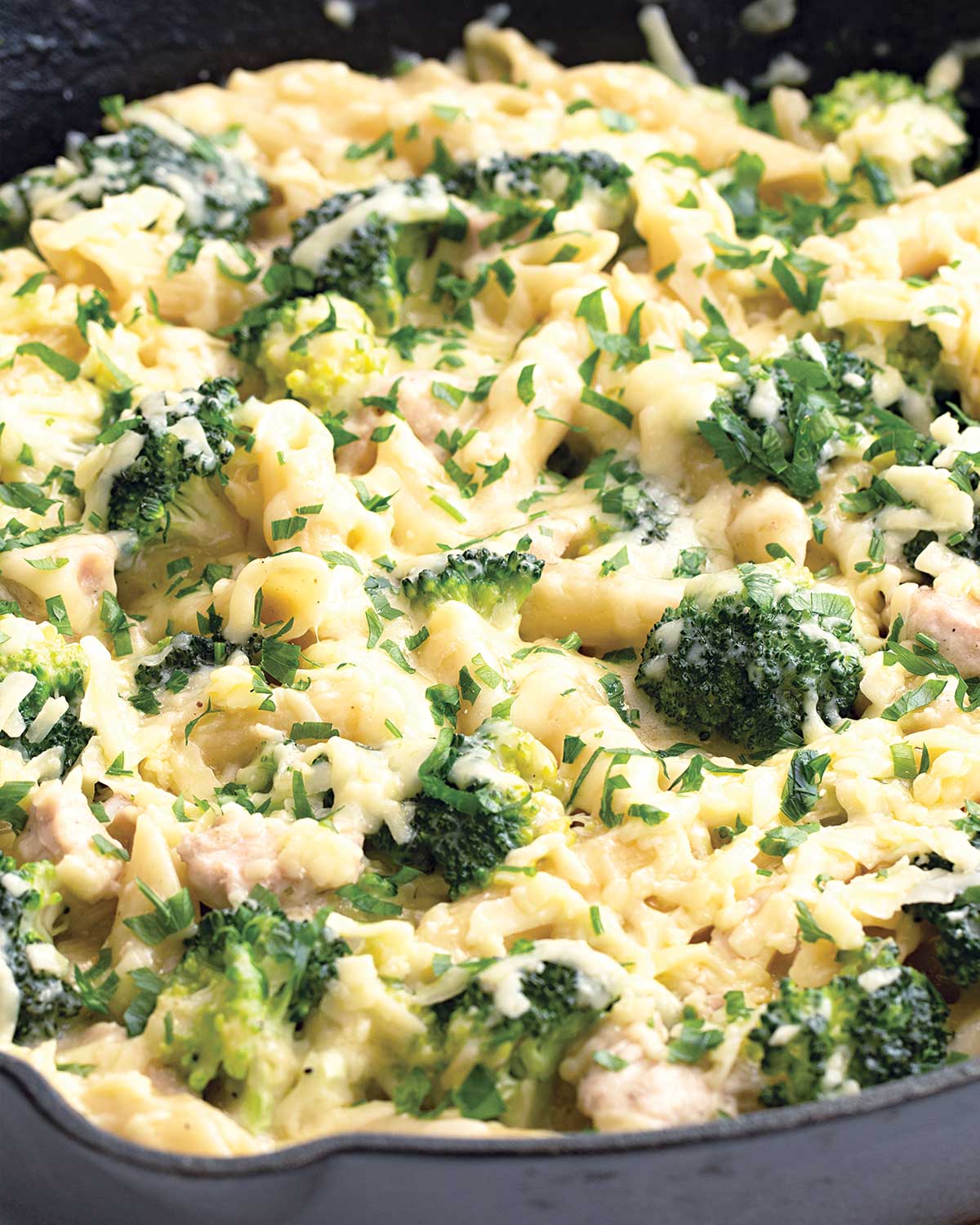 closeup of broccoli chicken casserole in a skillet.
