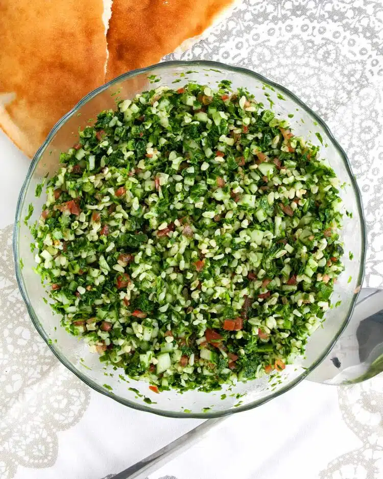 overhead shot of tabbouleh salad freshly made in a bowl.
