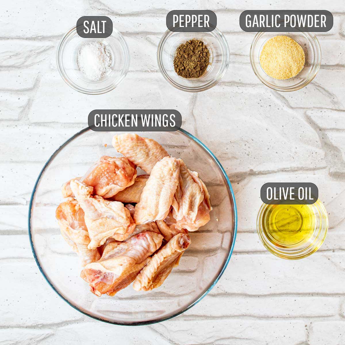 overhead shot of ingredients needed to make chicken wings in the air fryer.