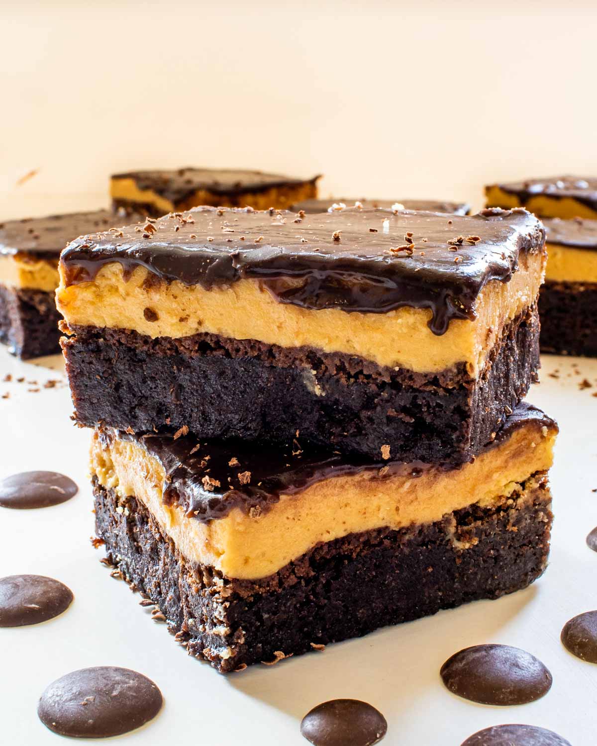 two peanut butter brownies stacked on top of each other.