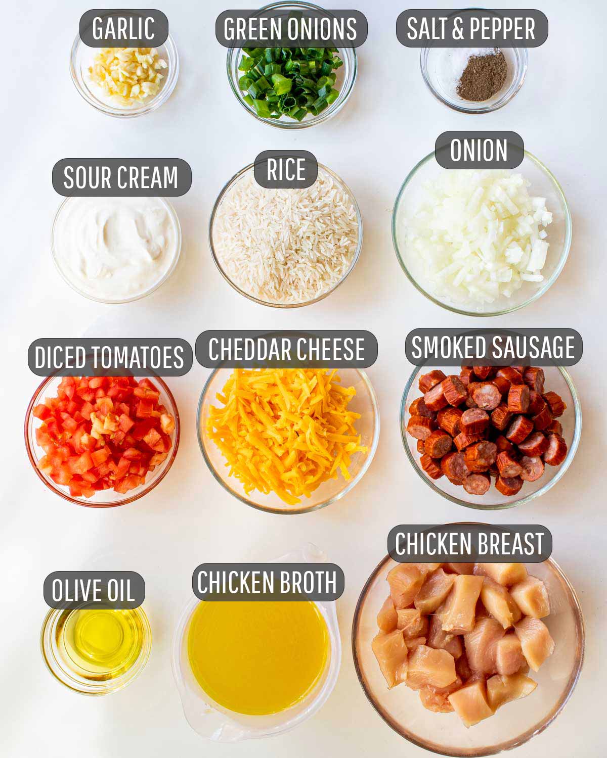overhead shot of ingredients needed to make sausage chicken and cheesy rice.