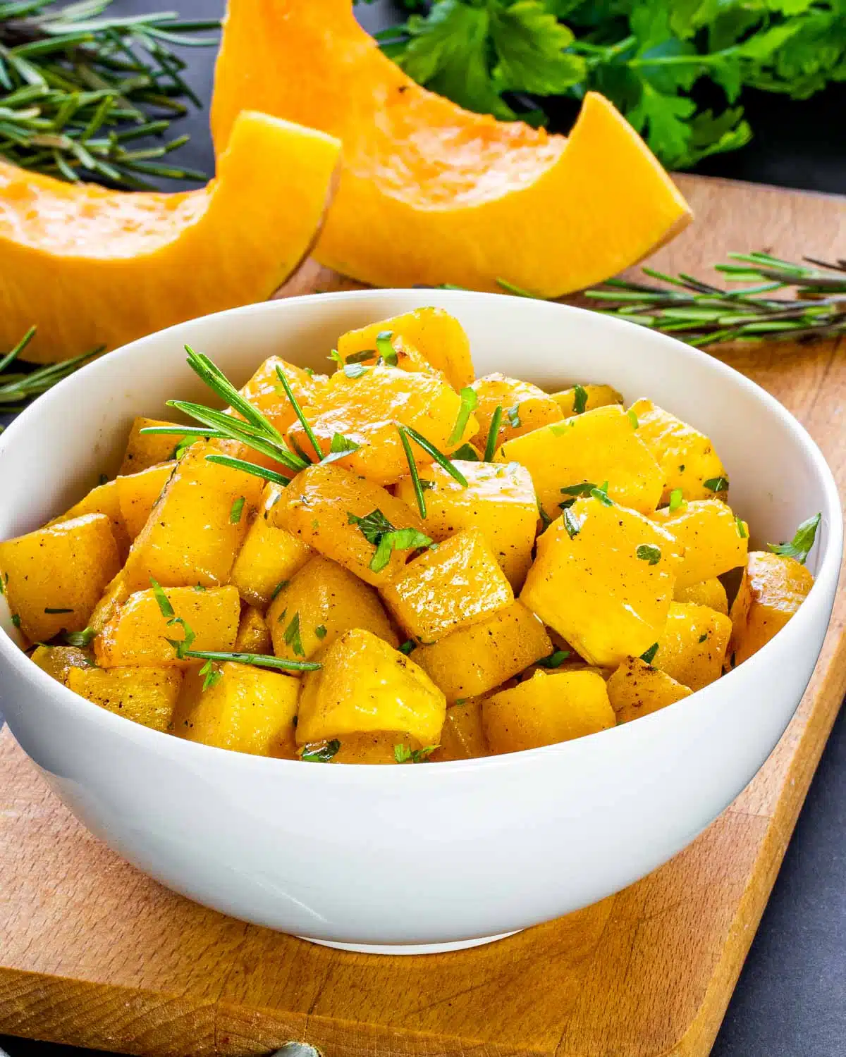 roasted butternut squash in a white bowl.
