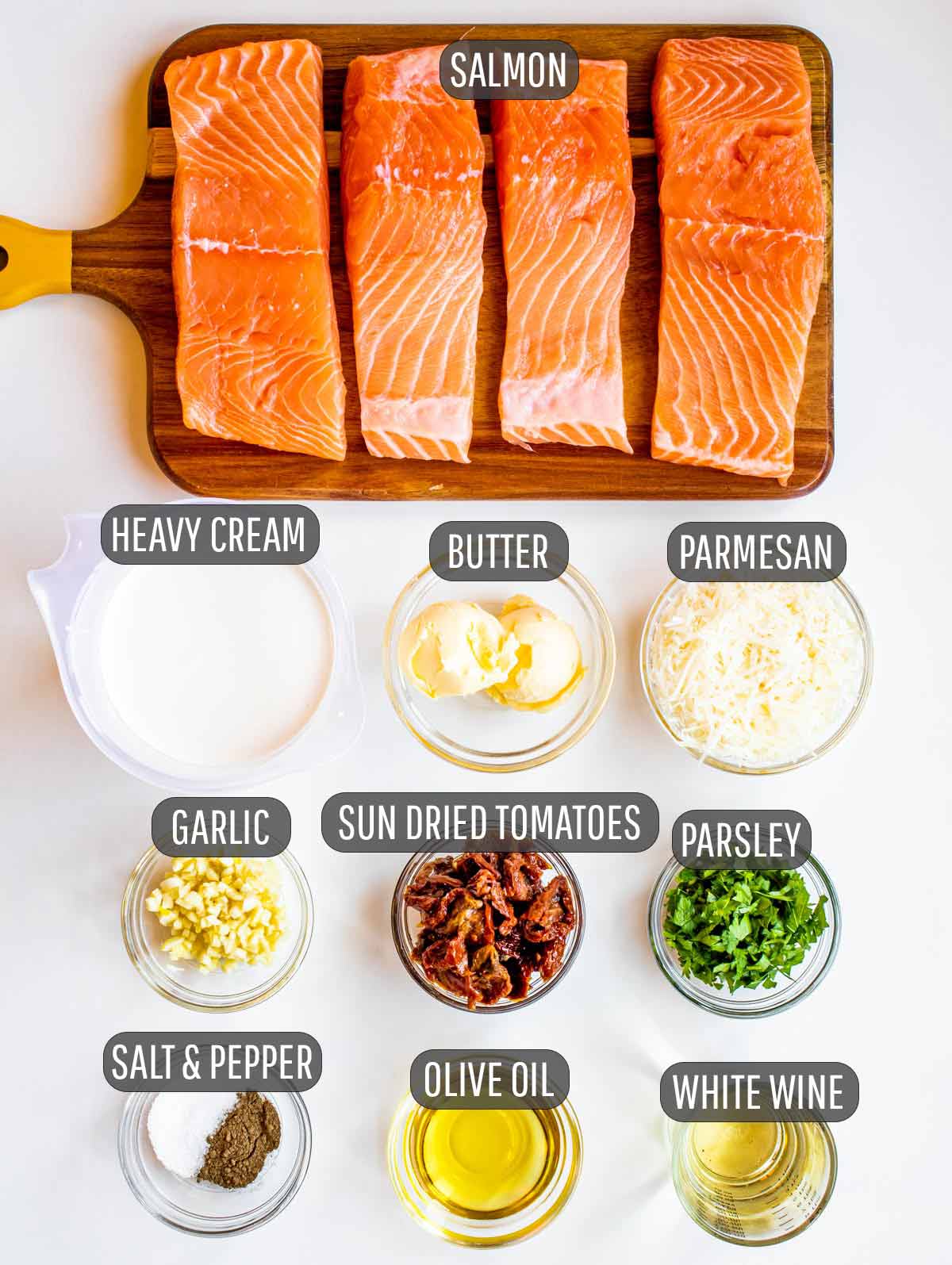 overhead shot of ingredients needed to make creamy tuscan salmon.