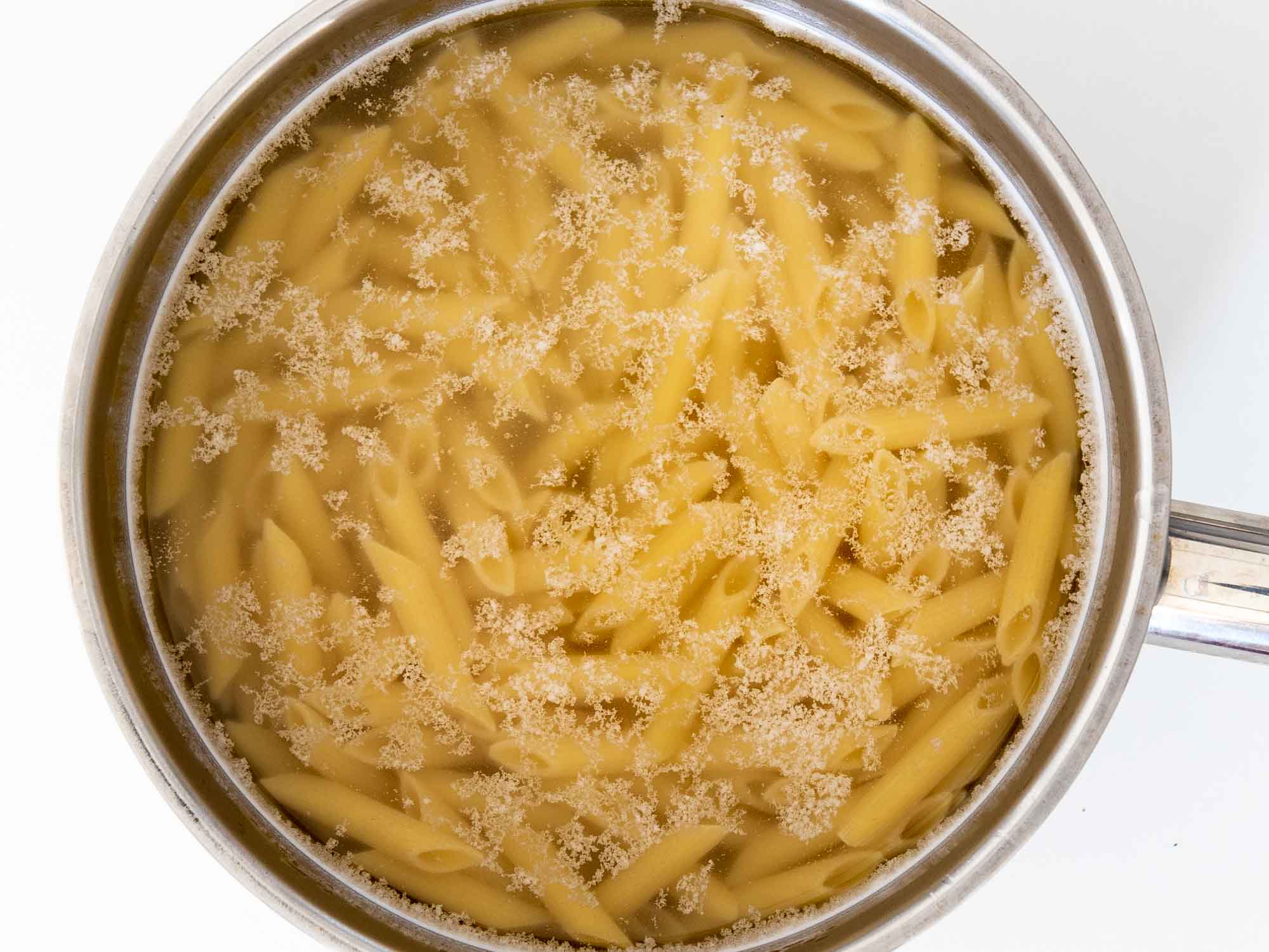 pasta in a pot of boiling water.