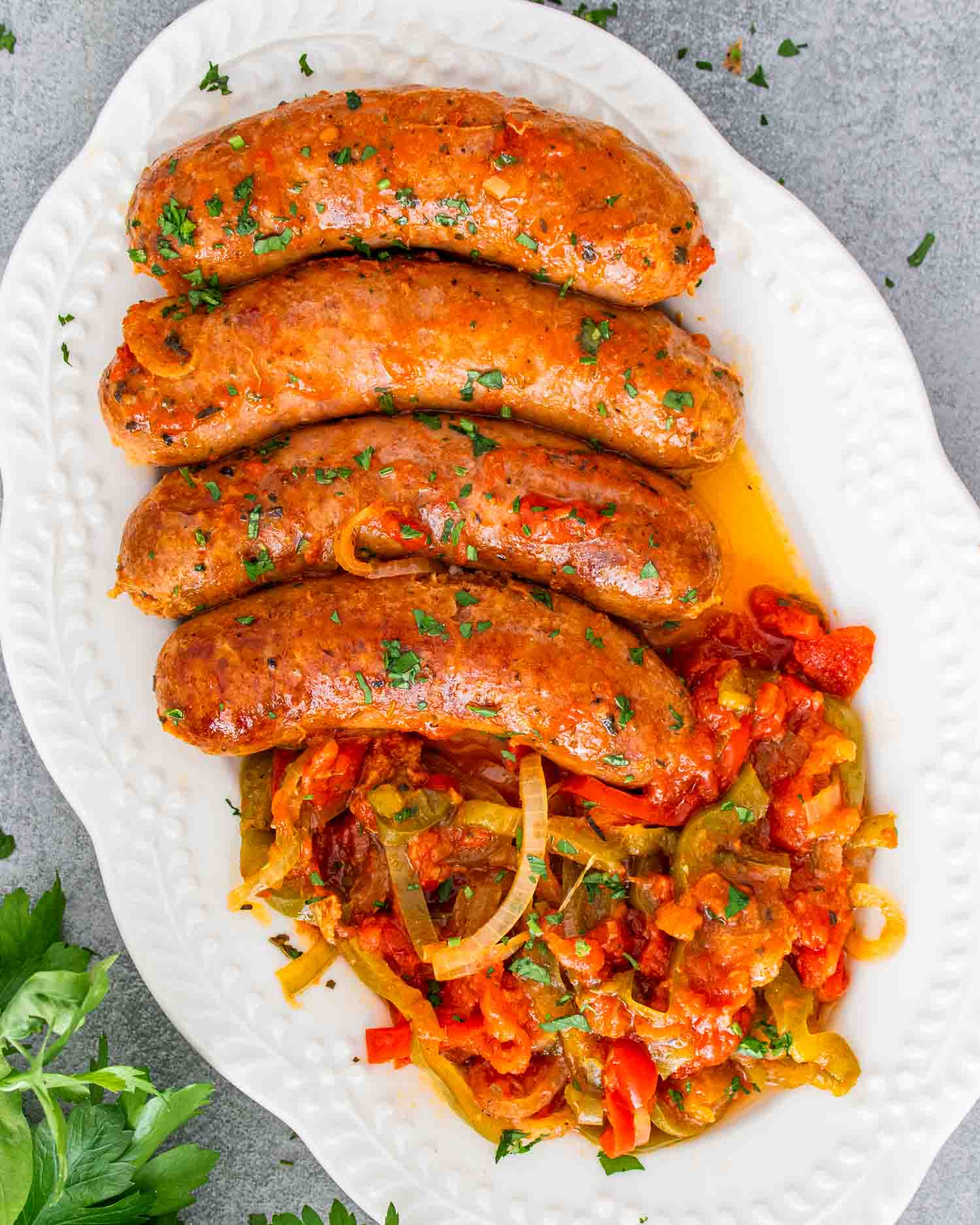 sausage and peppers on a serving platter.