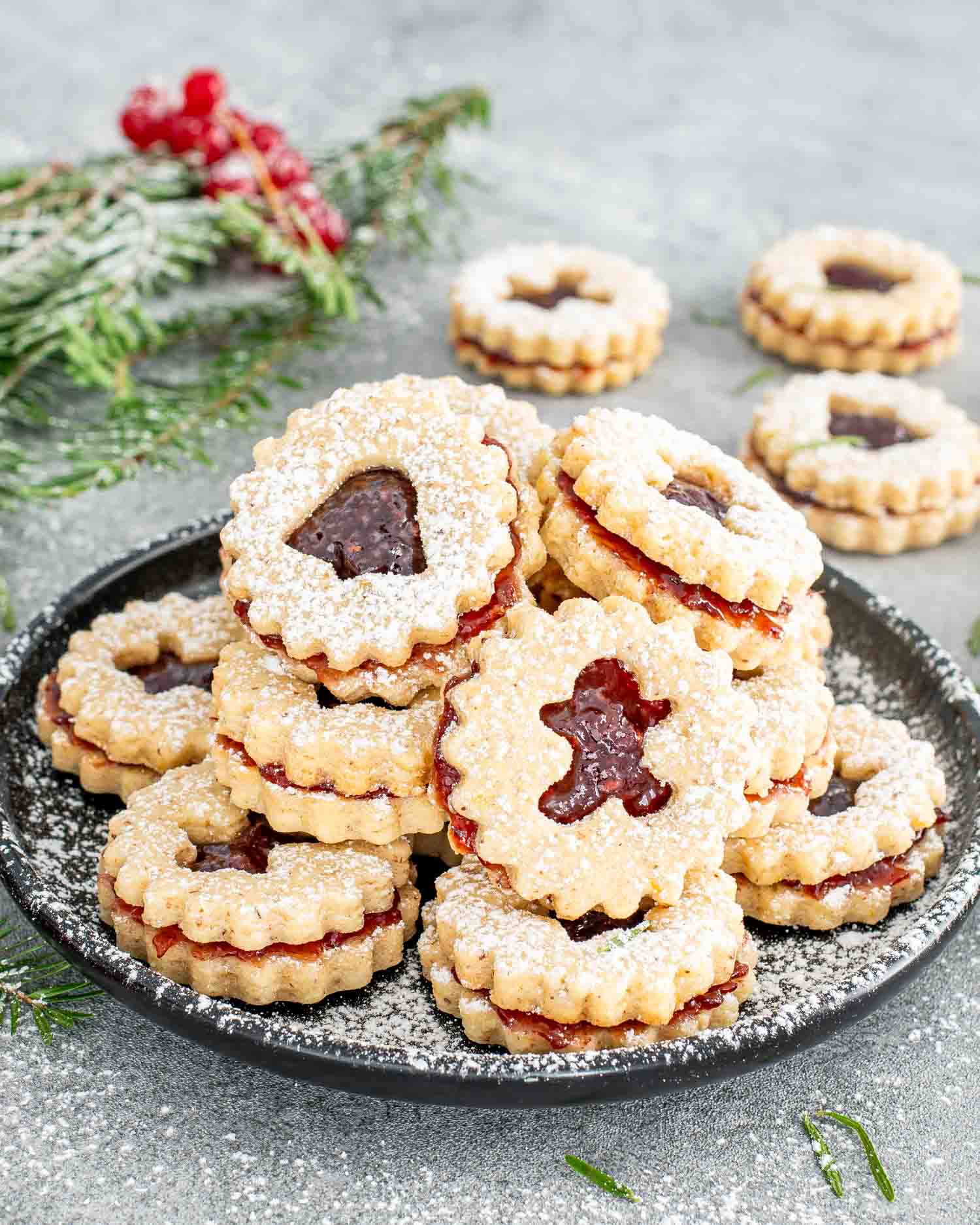 a plate with linzer cookies.