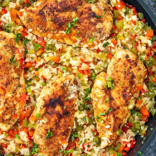 freshly made skillet cajun chicken and rice in a skillet.