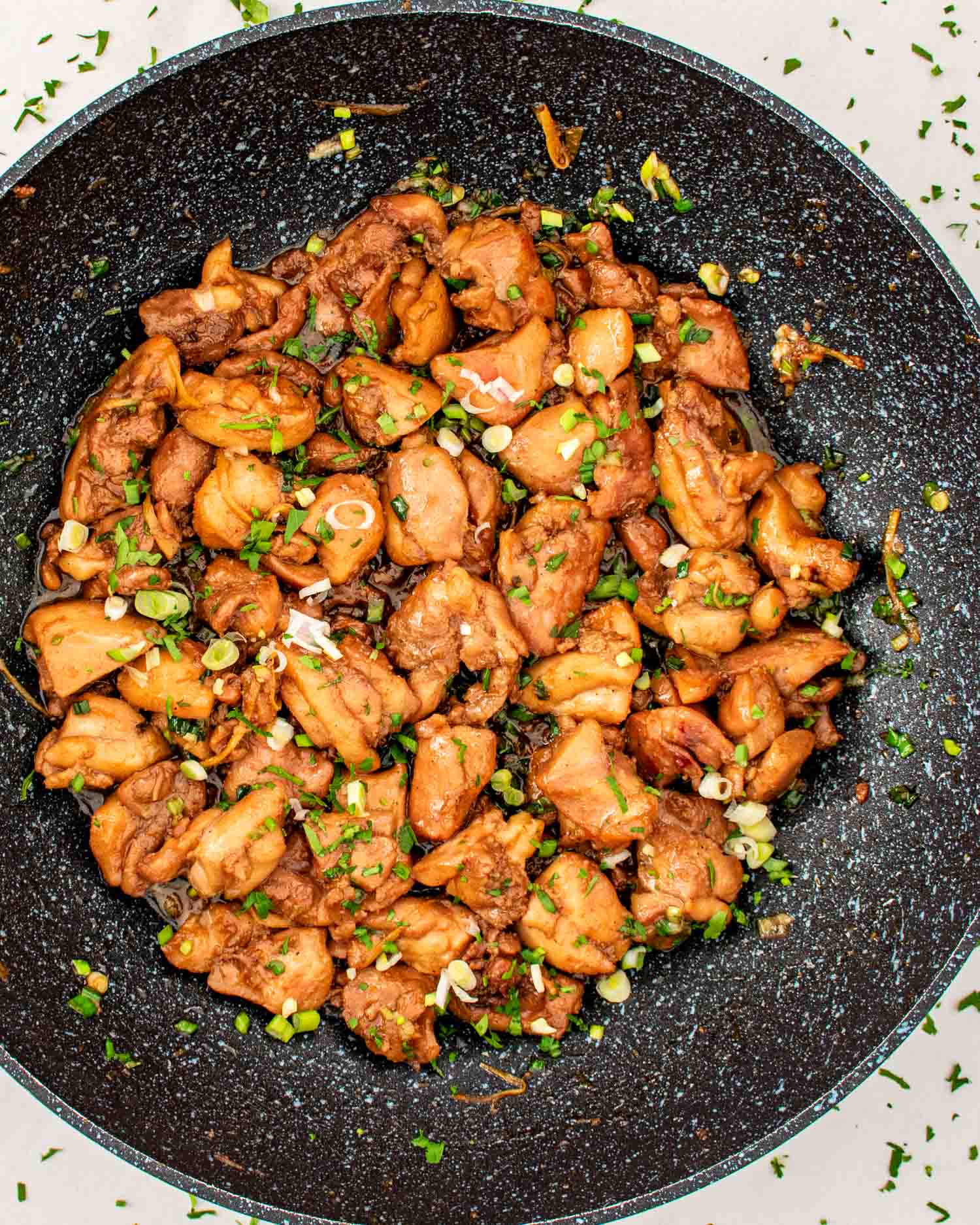 freshly made Vietnamese ginger chicken in a wok.