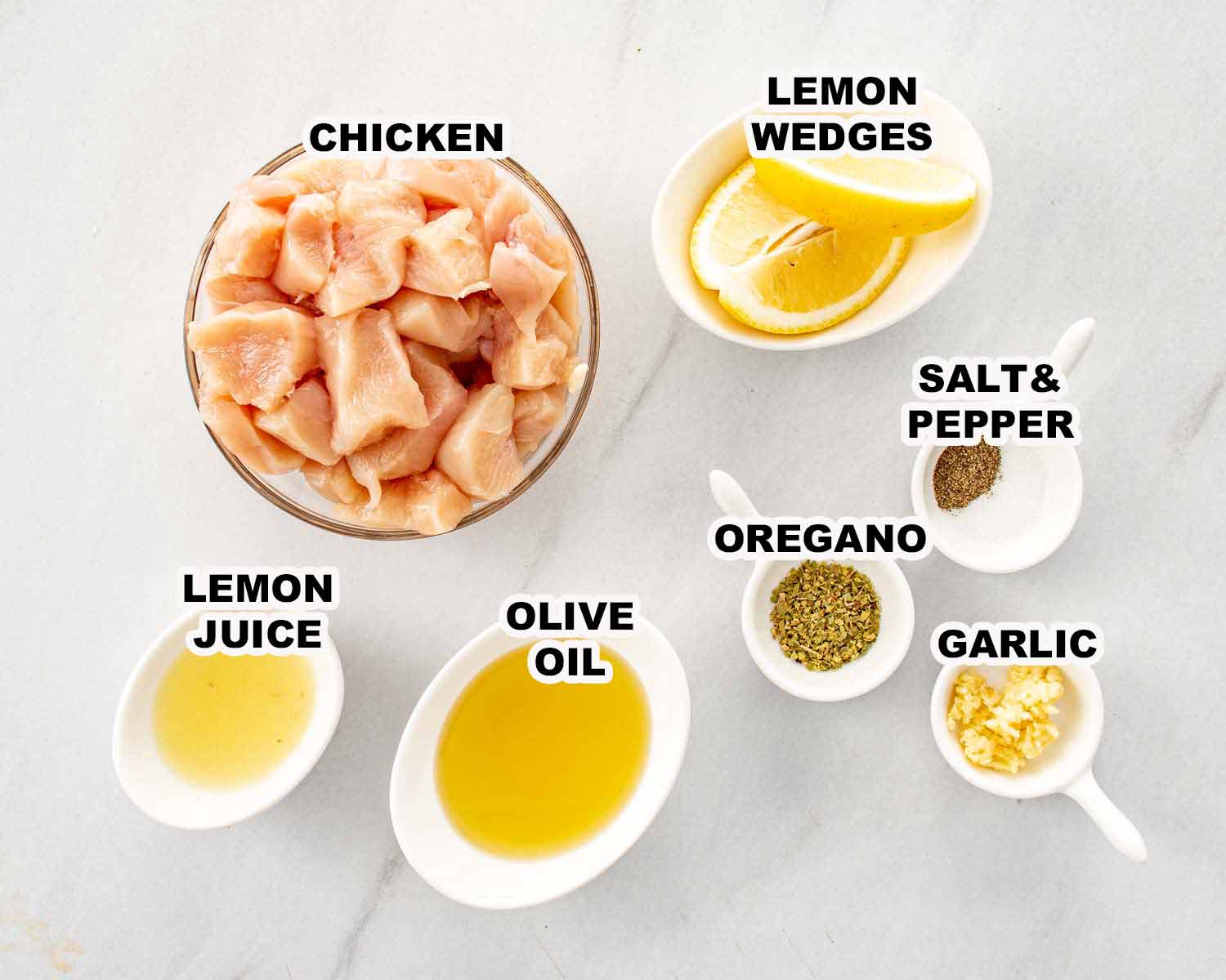ingredients needed to make grilled lemon garlic chicken skewers.