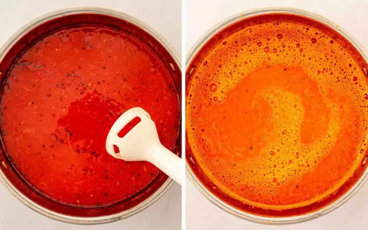 An immersion blender being used to purée the tomato soup in a pot then the soup fully blended into a smooth and silky texture.