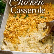 Creamy poppy seed chicken casserole with golden cracker topping and parsley sits beneath an elegant recipe title.