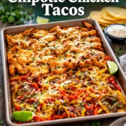 Cheesy chipotle chicken and vegetables on a sheet pan beneath white recipe lettering, with Craving Home Cooked branding below.